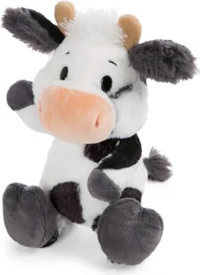 A plush toy cow sitting down, facing forward, with its left arm raised.
