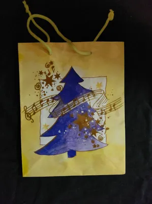 Dies ist eine Weihnachts-Geschenktüte mit einem aquarellartigen Design.