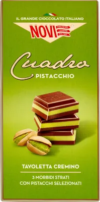 A box of Novi Cuadro Pistachio chocolates, with a stack of chocolates and pistachios shown.