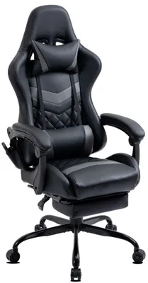 A black and gray gaming chair with a footrest is shown against a white background.