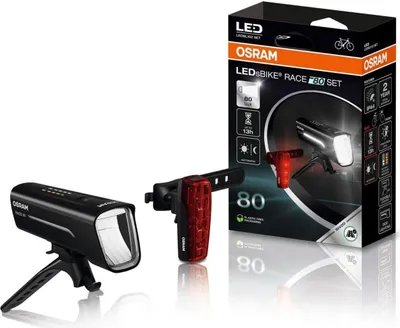 A product shot of bicycle lights and their packaging.