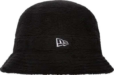 A black bucket hat with a textured surface and a white New Era logo on the side.