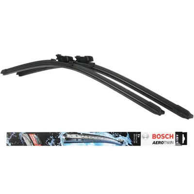 Two black windshield wiper blades are displayed diagonally against a white background, with a packaging strip at the bottom showing a car's taillight and water splashes.