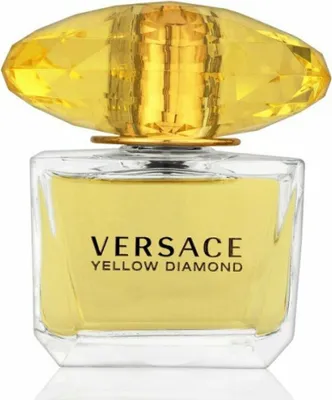 A studio shot of a Versace Yellow Diamond perfume bottle.
