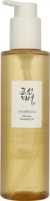 A bottle of cleansing oil with a pump dispenser.
