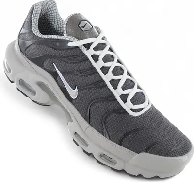 A studio shot of a single Nike Air Max Plus shoe.