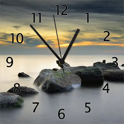 Produktbild von Wallario Design Wanduhr Mystische Felsen im Meer aus Echtglas, Größe 30 x 30 cm