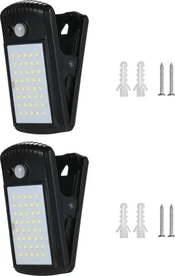 Two solar-powered outdoor lights with motion sensors and clip attachments are shown, along with mounting hardware.
