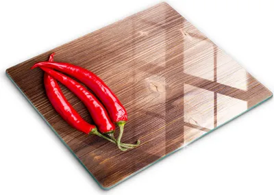 Produktbild von Glasschneideplatte - Herdabdeckplatte - 60x52 - Schneidebrett - Spritzschutz - Chilischoten auf Holz