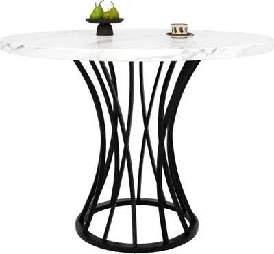 A round marble-top dining table with a black, sculptural base, set against a white background.