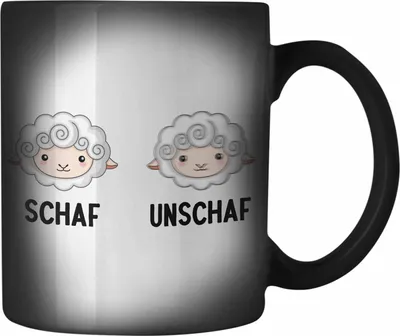 Produktbild von Trendation - Fotograf Farbwechsel Zauber-Tasse Lustiger Spruch Fotografie Geschenk Fotografieren Karabiner Farbwechsel Zauber-Tasse Edelstahl Geschenkideen Schaf Unschaf (Schwarz)