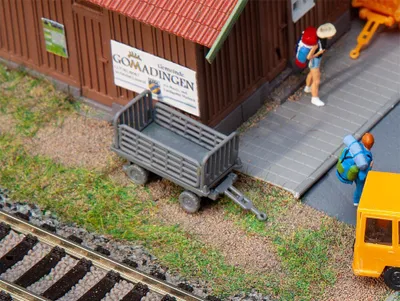 Produktbild von Faller 2 Bahnsteigwagen, grau 180990