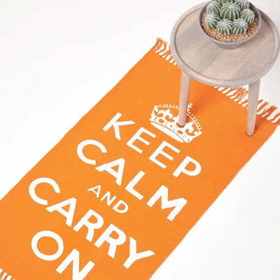 Immagine prodotto di HOMESCAPES Tappeto in cotone Keep Calm and Carry On - arancione-bianco, 60x100 cm