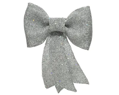 A silver glitter bow on a white background.