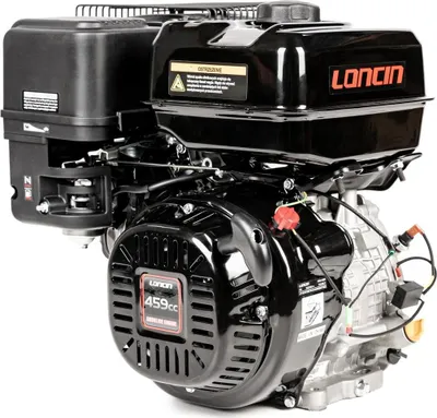 A close-up studio shot of a black and silver engine.