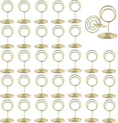 Immagine prodotto di Ganci da tavolo rotondi per foto e appunti, ideali per matrimoni, anniversari e feste