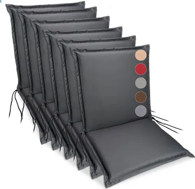 A set of dark gray chair cushions arranged in a fanned-out display.