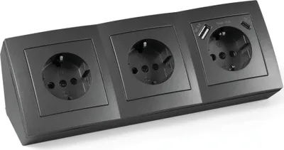 A black power strip with three outlets and two USB ports.