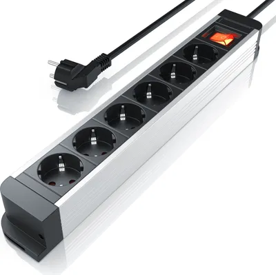 A power strip with multiple outlets and a switch, shown from a diagonal angle on a white background.