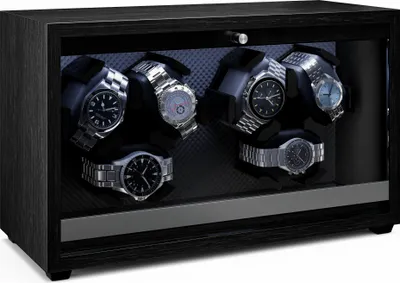 A watch winder box with six watches inside, displayed in a dark, modern setting.