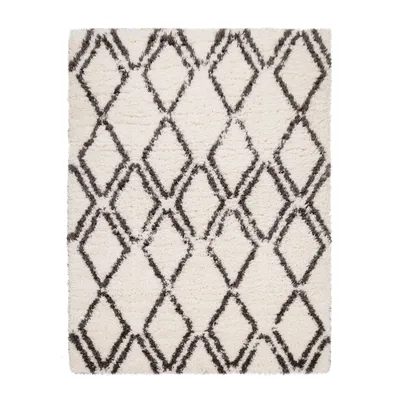 A shaggy rug with a diamond pattern.