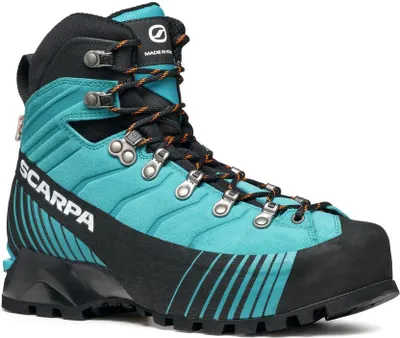 Bergschuh "Ribelle HD Wmn Mountain Elite" von Scarpa in Türkis mit schwarzem Obermaterial und orangefarbenen Schnürsenkeln.