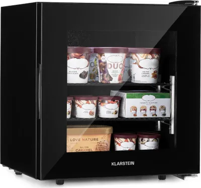 A black mini-refrigerator filled with various tubs and boxes of ice cream.