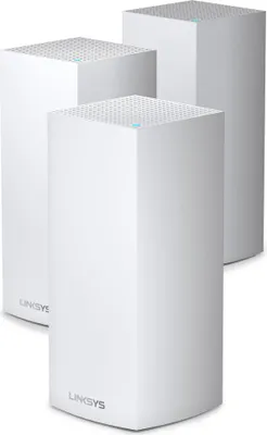 Three white Linksys Velop mesh Wi-Fi routers are arranged in a staggered formation against a white background.