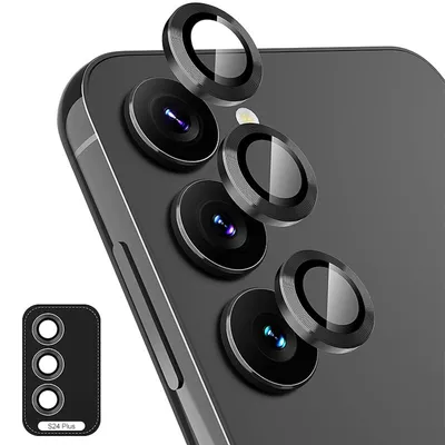 Close-up of camera lens protectors on a smartphone.