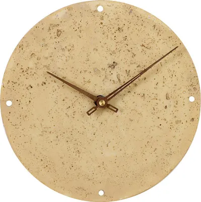 A round wall clock with a stone-like texture and brown hands.