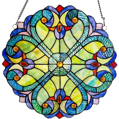 A stained glass suncatcher hanging against a white background.