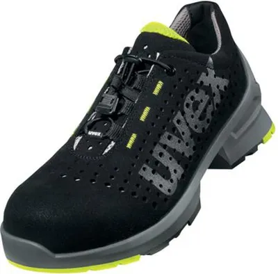 A single black safety shoe with gray and yellow accents is shown against a white background.