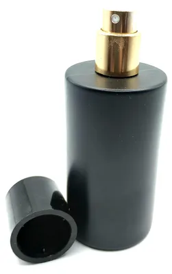Schwarze Runde Flasche 50 ml mit Goldpumpe