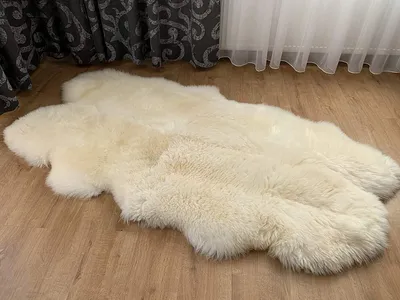 Produktbild von Sheepmania Qaudro Lammfell Teppich Echt Ungeschoren - Dichtes Langhaar Schaffell Echt bis 10 cm - Schaffell Teppich Decke Kamin Lammfelldecke Kinderwagen - Weiß