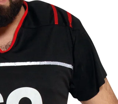 Close-up of a person wearing a black sports jersey with red and silver accents.
