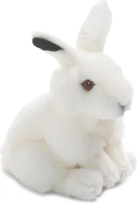 A plush toy rabbit sitting on a white background.