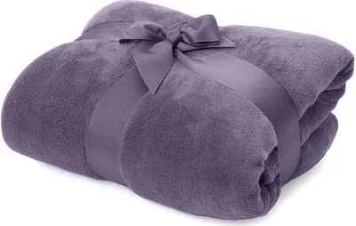A folded purple blanket tied with a ribbon.