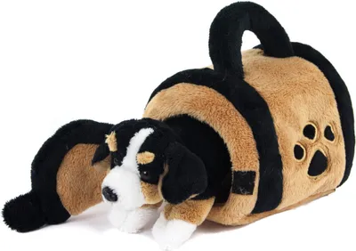 A plush toy dog lying down on a white background.