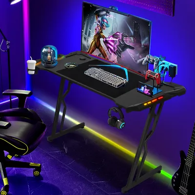 Produktbild von Faziango 140 x 60cm LED Gaming Tisch, Gaming Schreibtisch mit Mauspad, PC Tisch Gamer Tisch Computertisch mit Kopfhörerhaken Schwarz
