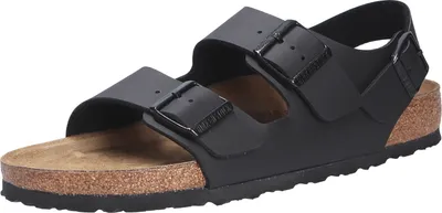 A black Birkenstock Milano sandal with two adjustable straps and a heel strap, shown from a side-angle on a white background.