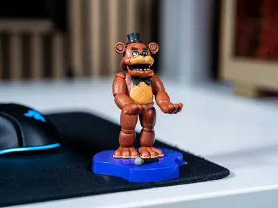 Produktbild von Exquisite Gaming Fünf Nächte Bei Freddy´s Freddy Holdems Cable Guys Mini Gerätehalter Und Telefonständer Lila Lila One Size