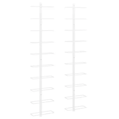 Two white metal wine racks are displayed against a white background.