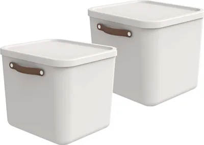 Two white storage boxes with brown handles are shown against a white background.