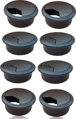A set of eight black cable grommets arranged in a grid.