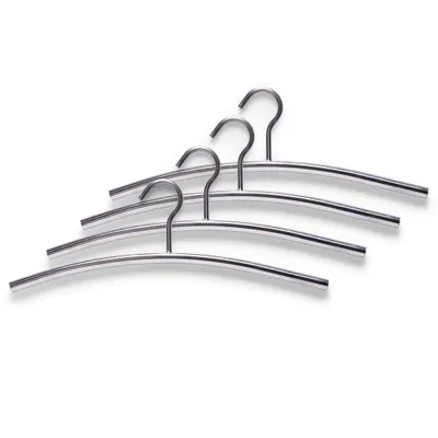 Four metal hangers are stacked diagonally on a white background.