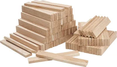 A pile of small wooden blocks, likely for crafting or building.