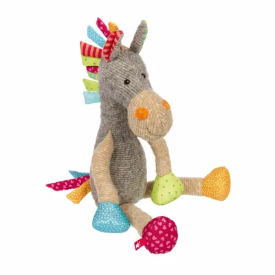 A stuffed toy horse sitting on a white background.