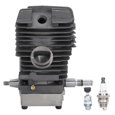 A chainsaw cylinder assembly with a spark plug and a primer bulb shown against a white background.