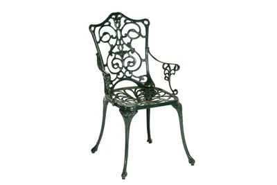 A single green ornate chair is shown against a white background.