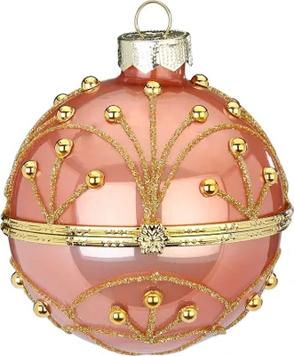 A single pink glass Christmas ornament with gold glitter and bead embellishments.